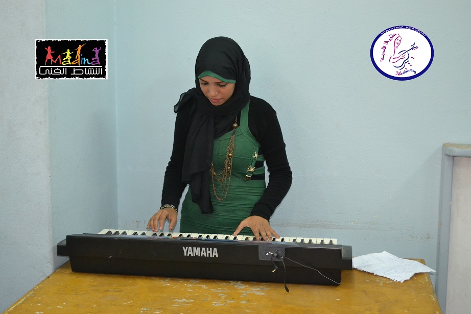 الطالبة هدير محمد الحاصلة على المركز الأول عزف فردى أورج على مستوى الجمهورية 2014